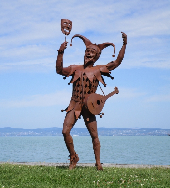 Harlequin park sculpture rusty iron